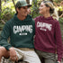 Flip the switch—you're in Camping Mode now. This hoodie says it all in a rugged forest tree font that looks like it was hand-carved by a squirrel with a crafting hobby.